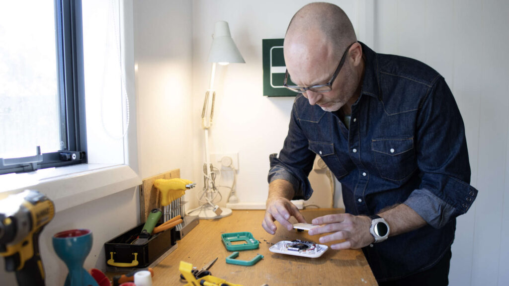 Pro-Dev team reviewing prototype parts and components — product design and manufacturing New Zealand