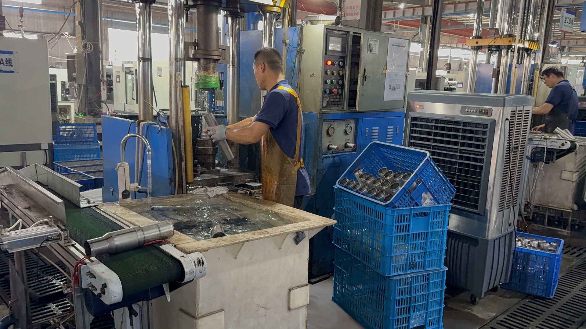 Pro-Dev reviewing manufacturing output at production stage — physical product development